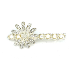 Elegant silver metal daisy hair clip with sparkling rhinestones and white pearls