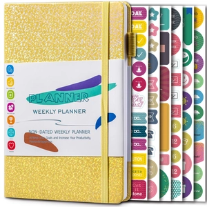 Detail of yellow glitter undated weekly planner with productivity stickers and elastic closure