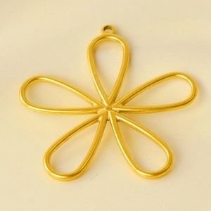 Close-up of a gold hollow five-petal flower pendant in polished 304 stainless steel
