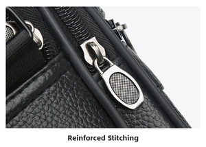 Macro shot of reinforced stitching and lychee grain leather on black crossbody bag