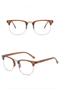 Front and 45-degree side views of tea-brown semi-rimless frames with silver accents