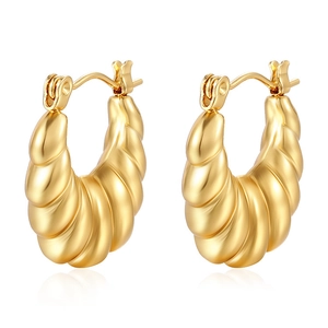 French vintage gold plated stainless steel croissant hoop earrings on white background