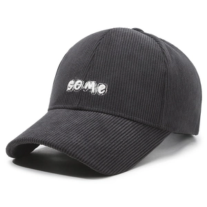 Dark grey corduroy baseball cap with white some embroidery on plain white background