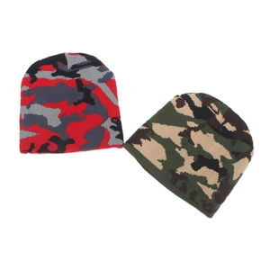 Knitted camouflage beanies in red and green patterns for winter outdoor warmth