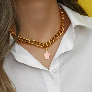 Chunky 11mm gold stainless steel chain necklace with pink mushroom pendant on model