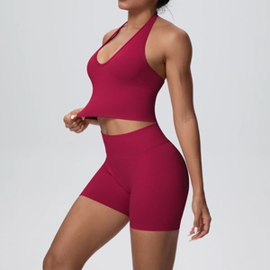 Close-up of high-elasticity ribbed seamless yoga set showing flexible halter top and shorts