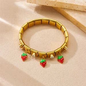 Gold plated stainless steel bracelet with red strawberry charm and crystal accents