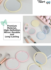 Macro view of macaron colored foldable round pocket mirror with dual magnification glass