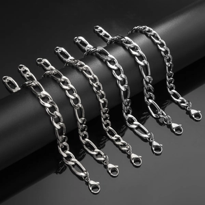 Detailed comparison of various thicknesses of silver Figaro chains with lobster clasps