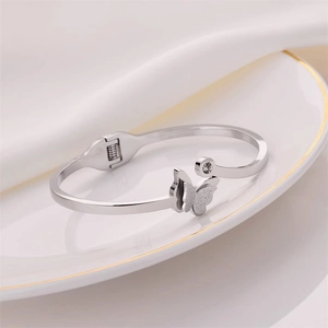 Elegant frosted butterfly open bangle with a clear zircon stone in silver finish