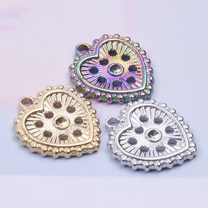 Three-piece set of heart-shaped stainless steel pendants in gold, silver, and rainbow colors