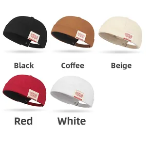 Docker hats in five colors featuring side fabric labels and adjustable metal buckles