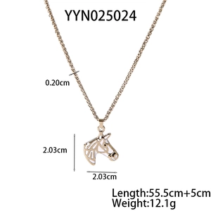 Detail of golden horse head pendant with white enamel on a 0.2cm rope chain