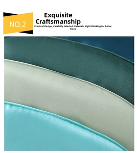 Detailed close-up of multiple colorful satin eye masks with smooth silk texture and neat piping