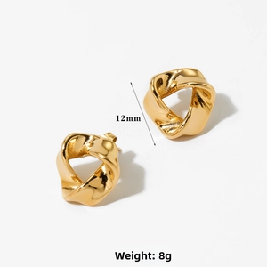 Macro shot of 12mm golden twisted knot stud earrings with polished metallic texture