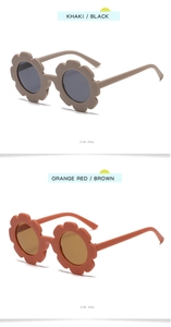 Detail view of khaki and orange flower-shaped sunglasses for kids with side profile