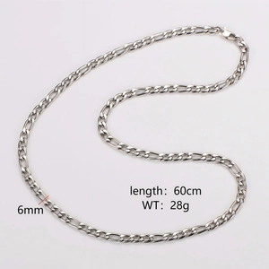 Detailed view of 6mm wide 60cm long silver stainless steel Figaro chain necklace