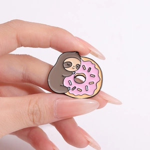 Exquisite cartoon sloth hugging a pink donut enamel pin made of durable zinc alloy