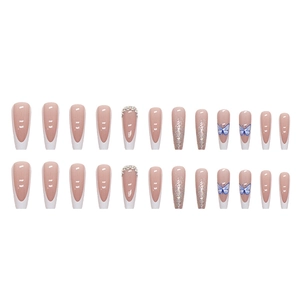 Faux ongles ballerine longs style français avec papillon bleu, paillettes et strass
