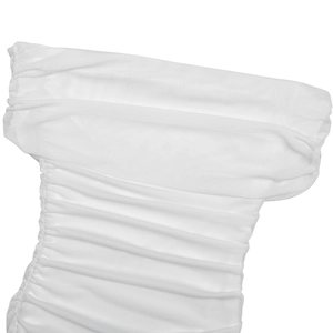 Close-up detail of white pleated mesh fabric texture on an elegant strapless mini dress
