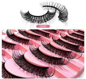 Detail of 10 pairs DD curl Russian strip lashes with dense layered design on pink tray