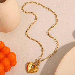 Collana vintage in acciaio inossidabile placcato oro 18K con ciondolo a cuore traforato