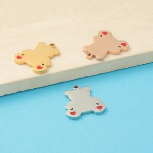 Polished stainless steel bear pendants in gold, rose gold and silver with red hearts