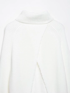 Close-up of white high-neck knit sweater featuring a stylish split overlap back design