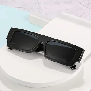 Classic black square frame sunglasses with dark lenses and minimalist thick rectangular rims