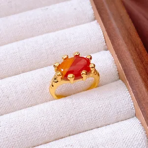 Vintage 18K gold plated oval red agate open ring with an artistic retro setting