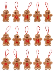 Macro view of gingerbread man felt ornaments featuring red embroidered alphabet letters