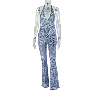 Detail of blue leopard print halter neck jumpsuit with flared leg silhouette