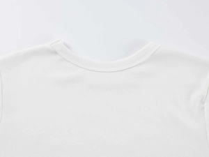 Close-up of the crew neck collar and double-stitched seams on the white modal t-shirt