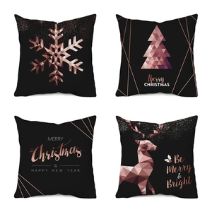 Set of 4 Christmas pillow covers with rose gold geometric reindeer and snowflake patterns