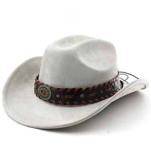 Detailed macro view of gray suede cowboy hat with vintage turquoise metal buckle and leather band