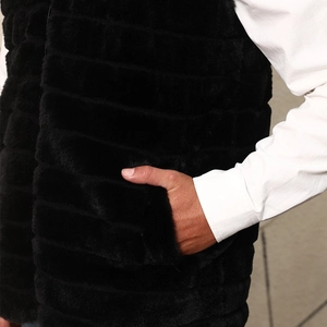 Men's faux fur vest in black featuring a stand collar and practical side pockets