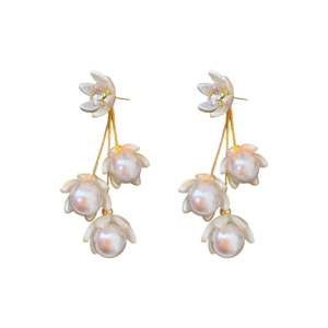 Elegant floral tassel earrings with gold metal, iridescent flowers and white pearls