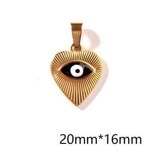Detailed macro view of gold heart pendant with evil eye motif and 20mm x 16mm dimensions