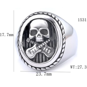 Punk vintage stainless steel skull ring featuring crossed guitar embossed design on white backdrop