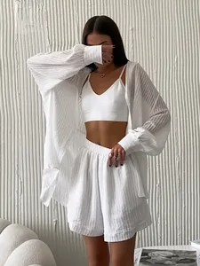 Three-piece casual white summer set for women featuring textured long sleeve shirt and shorts