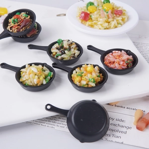Miniature frying pan keychain featuring realistic fried rice and noodle food models