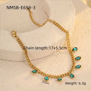 Detail of gold chain bracelet with turquoise teardrop charms and size specifications