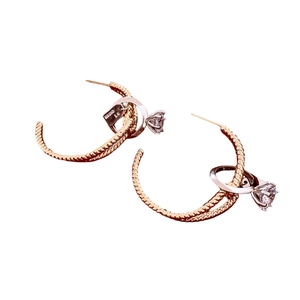 Elegant 18K two-tone twisted C-shape hoop earrings with sparkling zircon ring charms