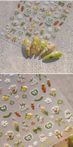 Détail de stickers pour ongles en relief avec lapins, carottes et motifs tulipes 3D