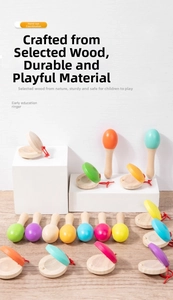 Detail of colorful wooden maracas and castanets for toddler musical sensory training