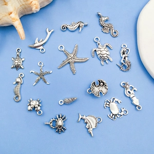 Detailed collection of silver alloy ocean charms including seahorses and starfish