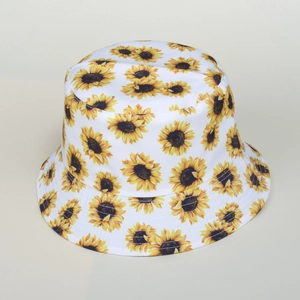 Detail of sunflower print on white cotton bucket hat with reinforced stitching
