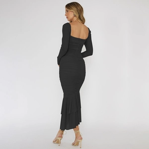 Rear view of sleek black long sleeve dress with square neck and fishtail hemline