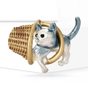 Cartoon alloy enamel cat brooch with gold basket and crystal eyes on white background