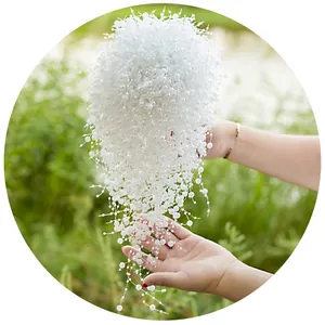 Handmade cascading bridal bouquet with white pearls for elegant wedding photography